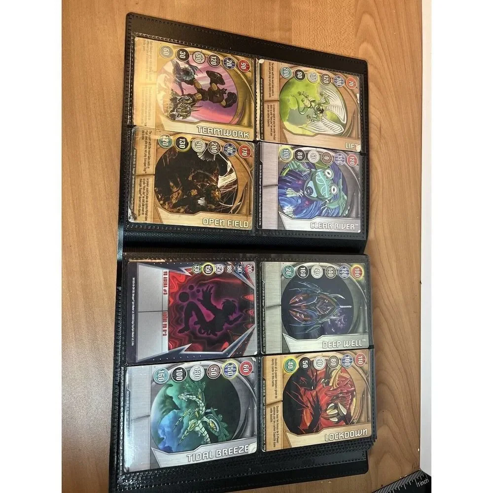 Collection Of Bakughan Trading Cards In Album